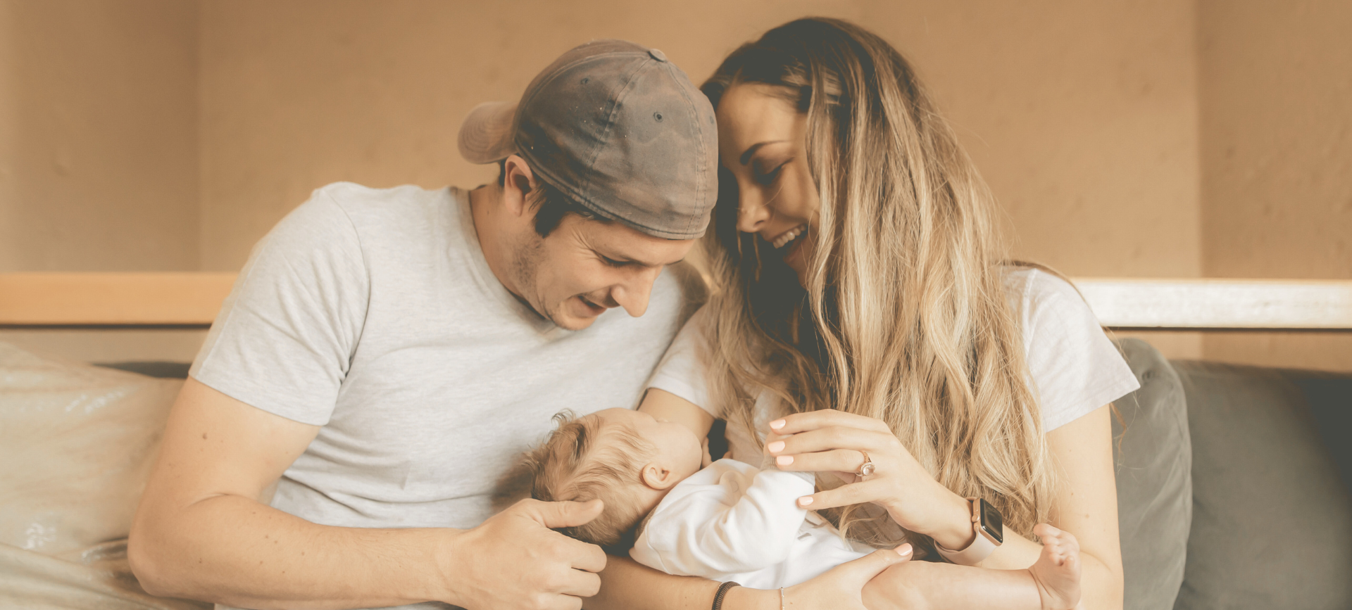 Mann und Frau mit Baby